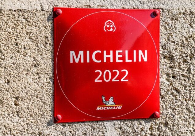 Bordeaux , Aquitaine France - 10 20 2021 : Michelin 2022 red star book Guide plate text sign with logo brand on good Restaurant Wall building