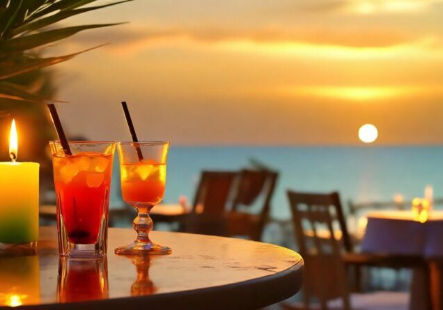diner de vacances à la table d'un hôtel bar restaurant avec cocktail vue mer et coucher de soleil, pour un apéritif et repas en amoureux