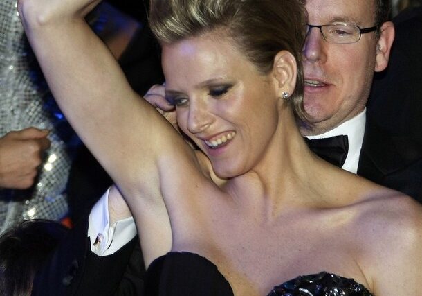 Prince Albert II of Monaco (R) dances with his friend Charlene Wittstock during the Bal de la Rose in Monte Carlo March 28, 2009. The Bal de la Rose is a traditional annual charity event in aid of the Foundation Princess Grace. REUTERS/Eric Gaillard (MONACO ROYALS SOCIETY)